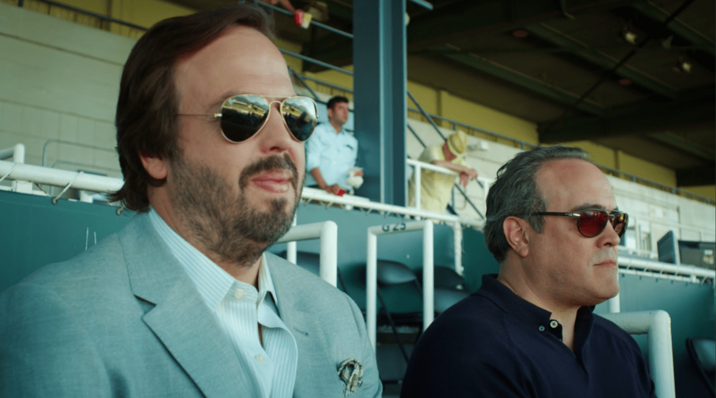two men wearing shades at ball game in Shut Eye