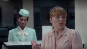 Lacie turns in shock from an airport counter in Black Mirror Nosedive