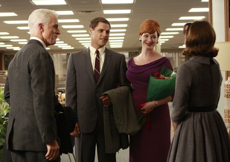 Joan with Peggy, Roger Sterling and her boyfriend in the office