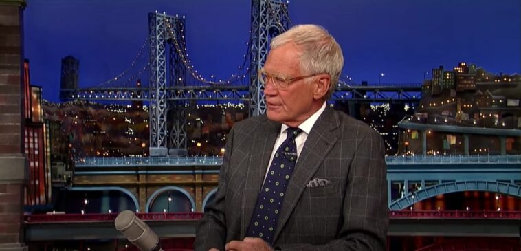 David Letterman behind his desk