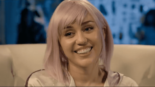 Ashley O offers a fake smile in Black Mirror