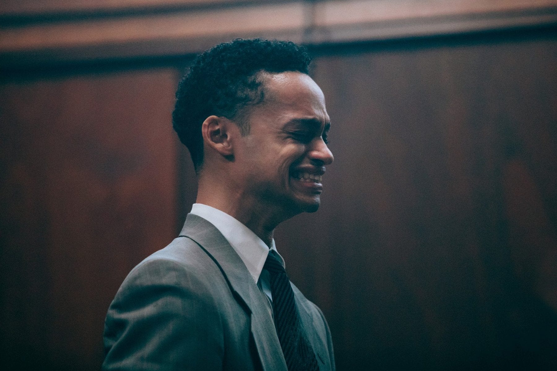The young Raymond Santana (Marquis Rodriguez) cries at trial in Netflix's When They See Us