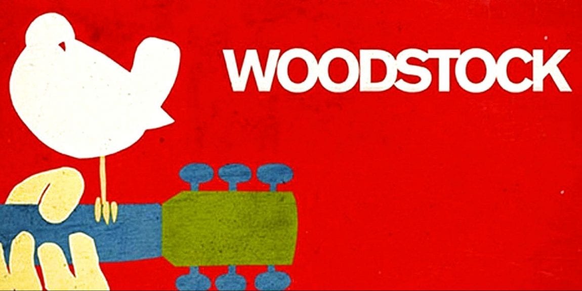 woodstock music festival logo featuring a white bird perched on the neck of a guitar with the word woodstock beside it