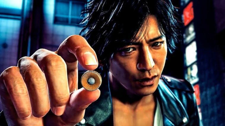 Takayuki Yagami from Judgement holds a bullet