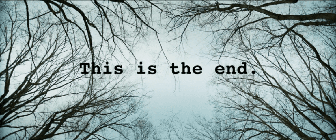 "This is the end" appears as text amongst trees