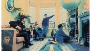 The Oasis band members sit in a flat as if they're in between writing songs on the cover of Definitely Maybe.