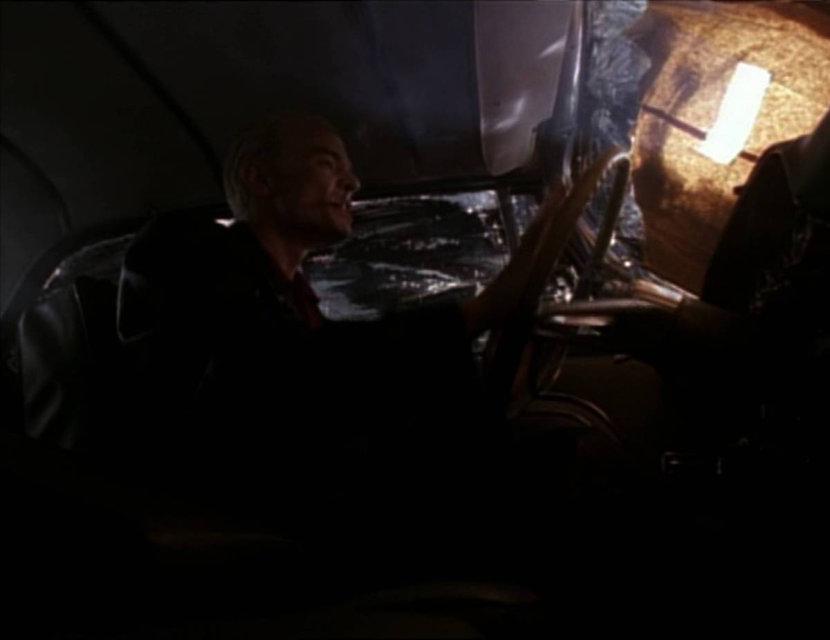 Spike sings while driving his car.