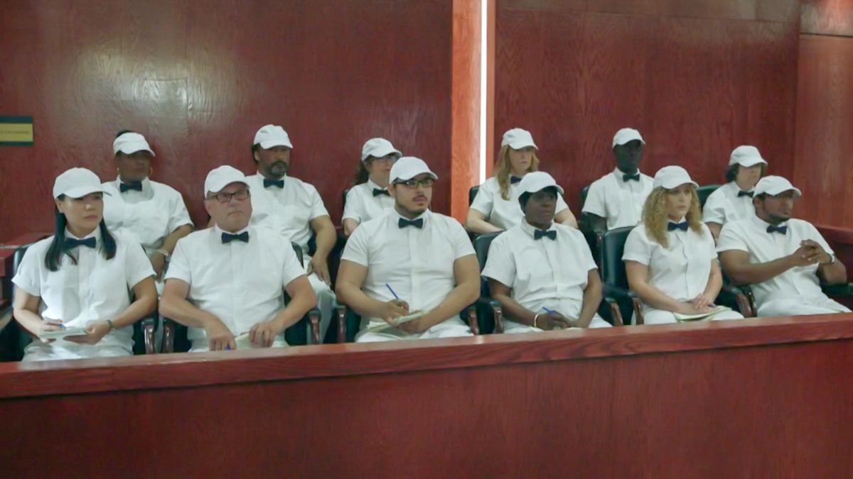 A jury sits in the stands, all dressed as ice cream men. [Mr. Mercedes S03E06]