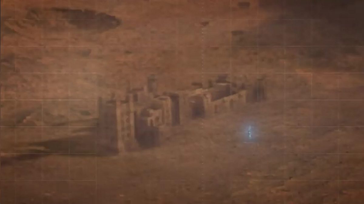 Dr Manhattan stands in front of a castle-like structure on Mars