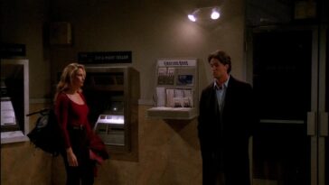 Model Jill Goodacre is in a locked ATM vestibule with Chandler Bing, who looks terribly uncomfortable and our of his depth.