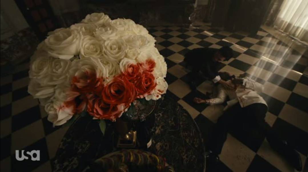 White roses are stained with blood as Chen lies on the floor after slitting his own throat