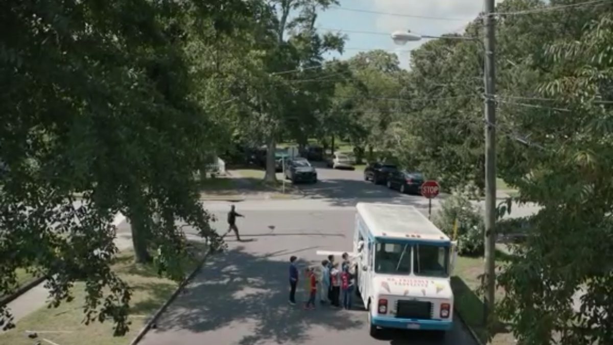 Mr Mercedes - An ice cream truck is parked on a street, a crowd of kids at the window