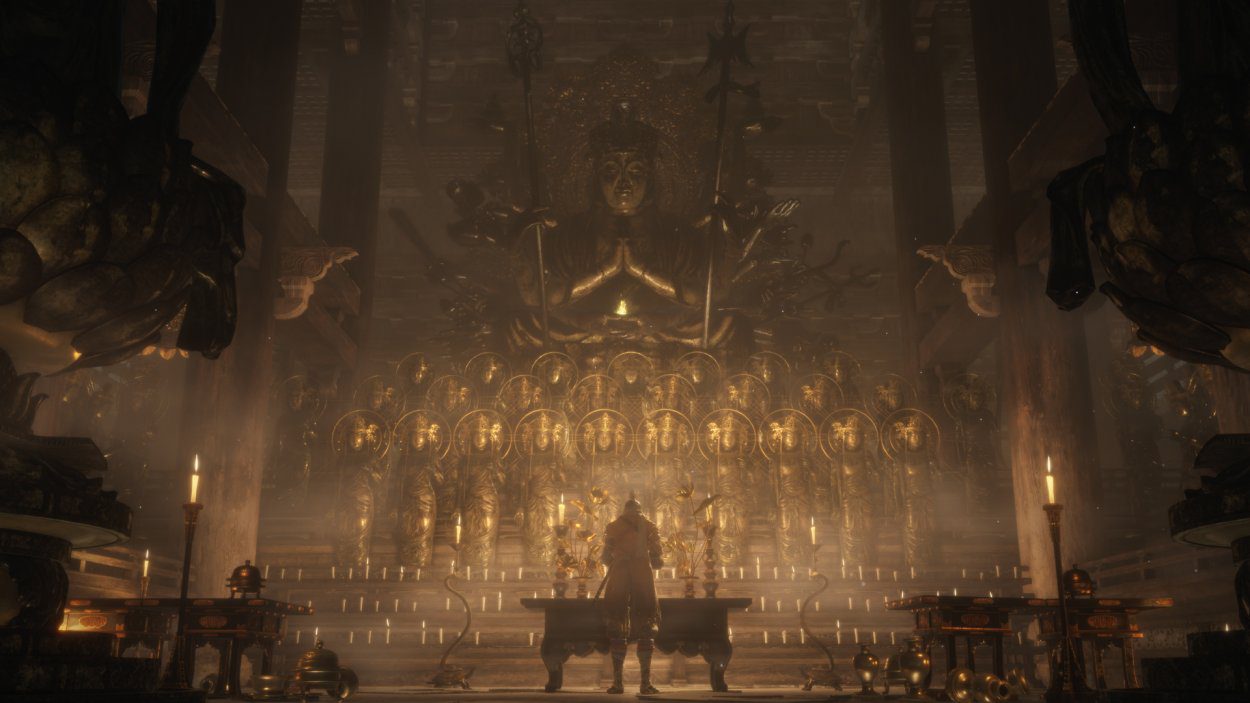 Sekiro stands in a large, golden temple praying at an altar.