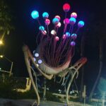 A sculpture with a number of spore-like bulbs protruding from it