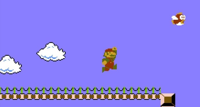 Super Mario navigates a bridge where red fish (Cheep Cheeps) shoot out of the water.