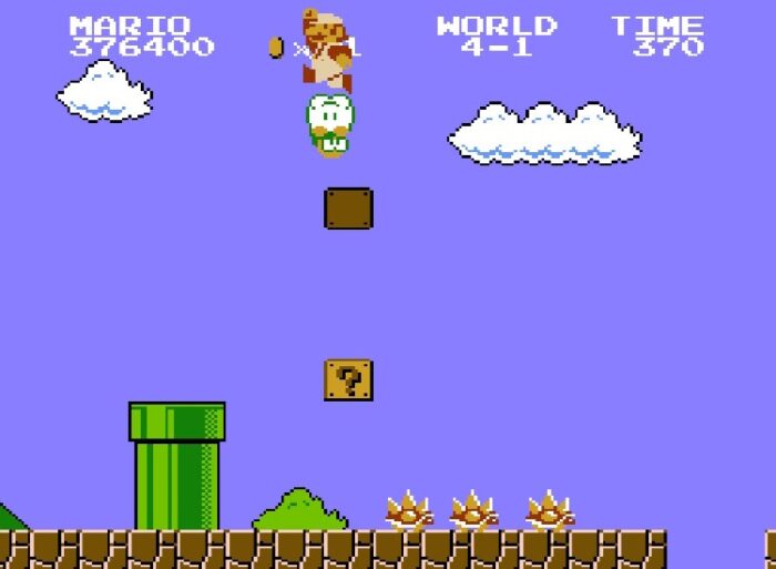 Super Mario jumps on top of Lakitu, a hooded little green guy in a cloud that drops red Spiney enemies down on you.