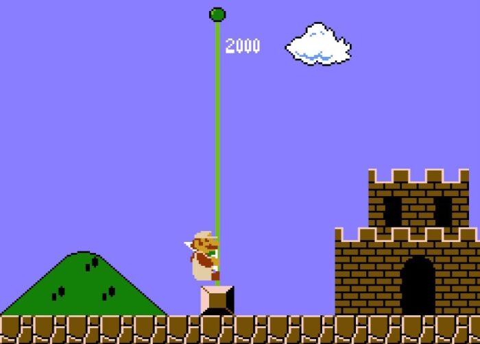 Mario slides down the flagpole at the end of the level, gaining 2000 points.