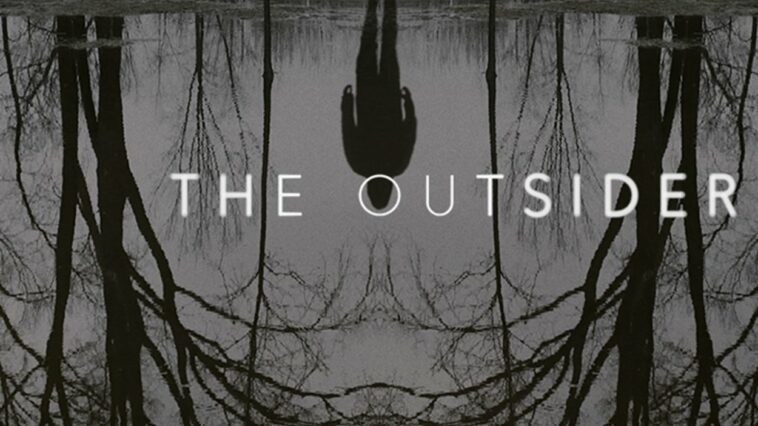 A shadow reflecting in water with the title card for The Outsider over the water