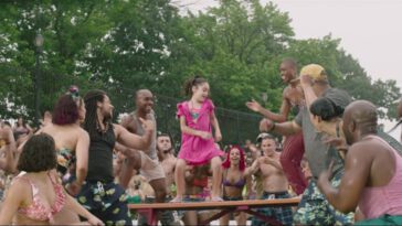 A girl dances on a table in the trailer for In the Heights