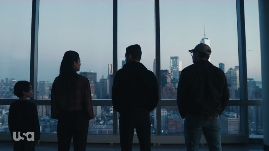 Elliot, Mr. Robot, Magda, and the Young Elliot look out on the NYC skyline