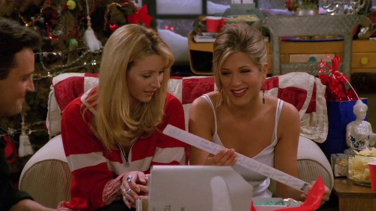 Rachel and Phoebe look at the wiper blades Chandler and Joey gifted Rachel