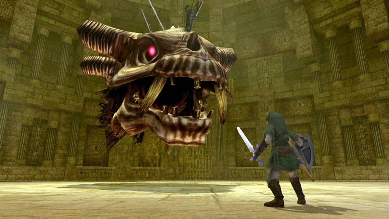 link in a battle with a dungeon boss. Link has his sword out, whilt the boss is a giant skeleton head that looks like a dragon. 