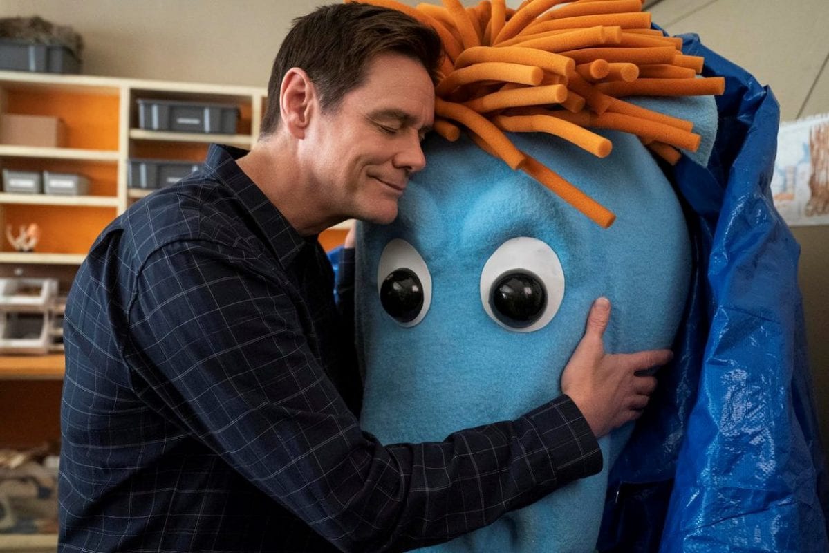 Jeff hugs one of his favorite puppets after a long time away