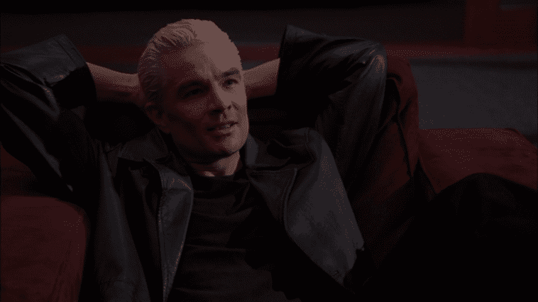 Spike lounges in a chair in Angel's office