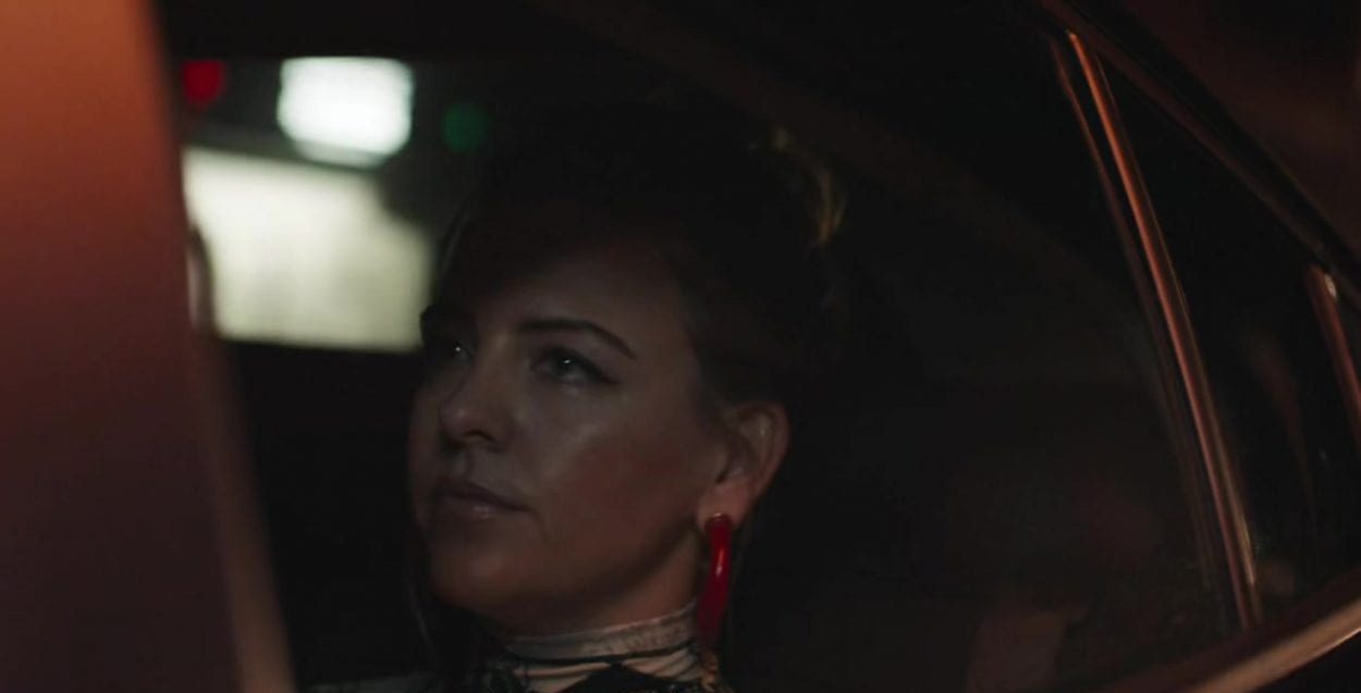 Lainey as seen through the backseat window of a car in High Maintenance S4E6