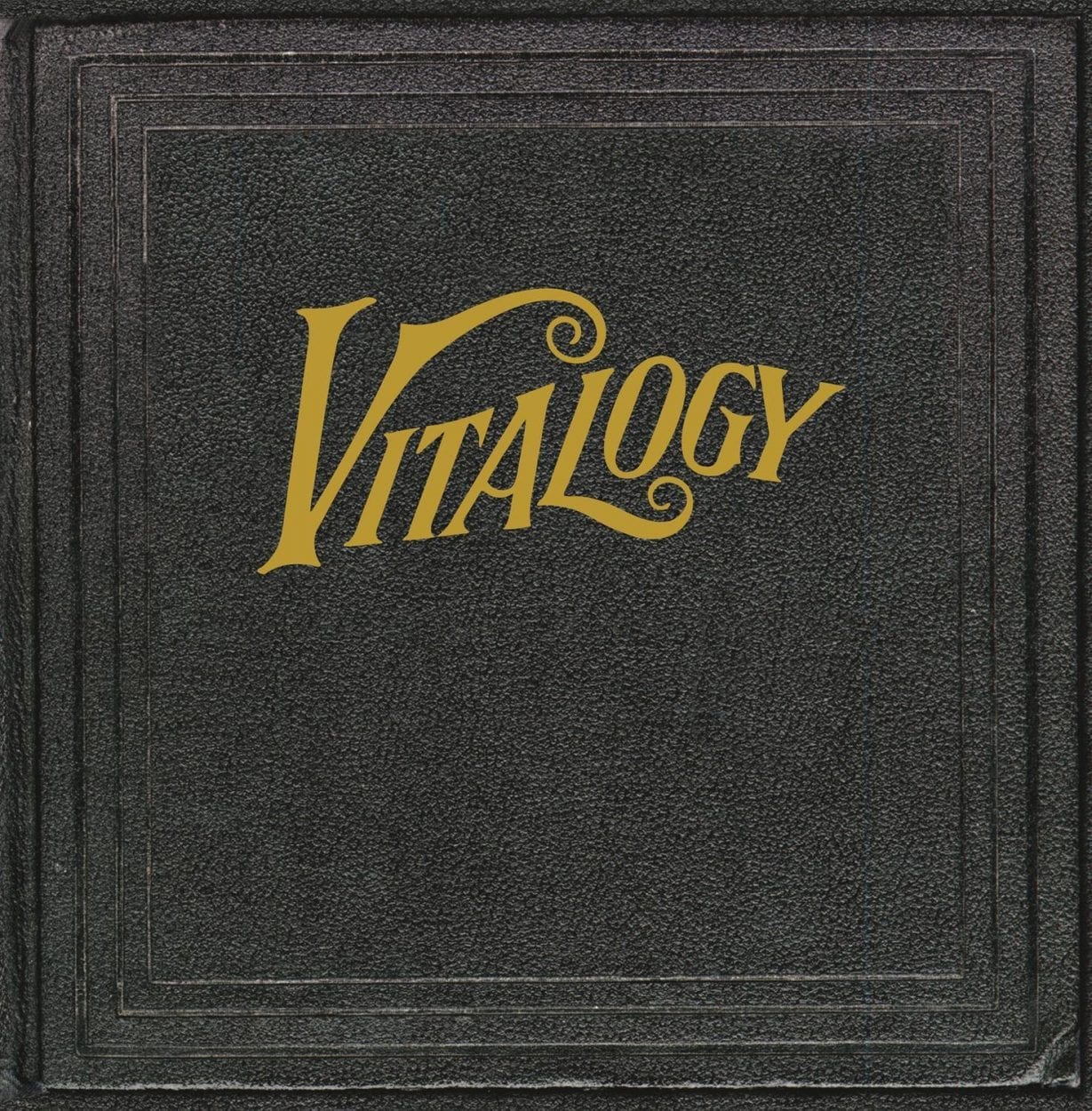 A black cardboard sleeve with “Vitalogy” centered in styled gold font.