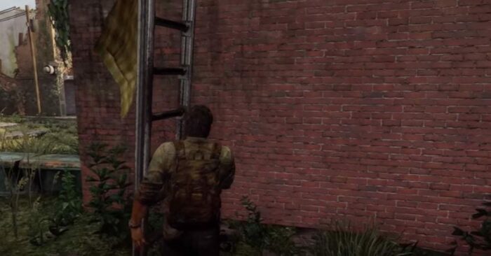 Joel from The Last of Us moves a ladder up against a brick wall.