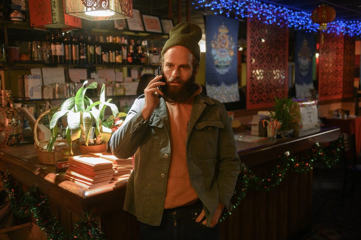 The Guy is on the phone at a restaurant in High Maintenance "Soup"
