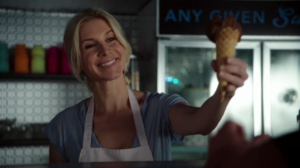 Ingrid (Elizabeth Mitchell) hands off an Ice cream in a scene from Once Upon A Time.