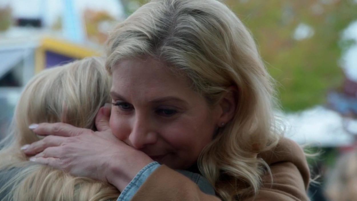 Ingrid (Elizabeth Mitchell) and young Emma (Abby Ross) share a hug in a scene from Once Upon A Time.