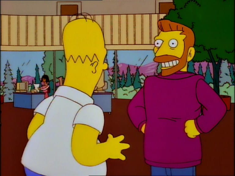 Hank Scorpio stands with his coat on backwards, grinning at Homer