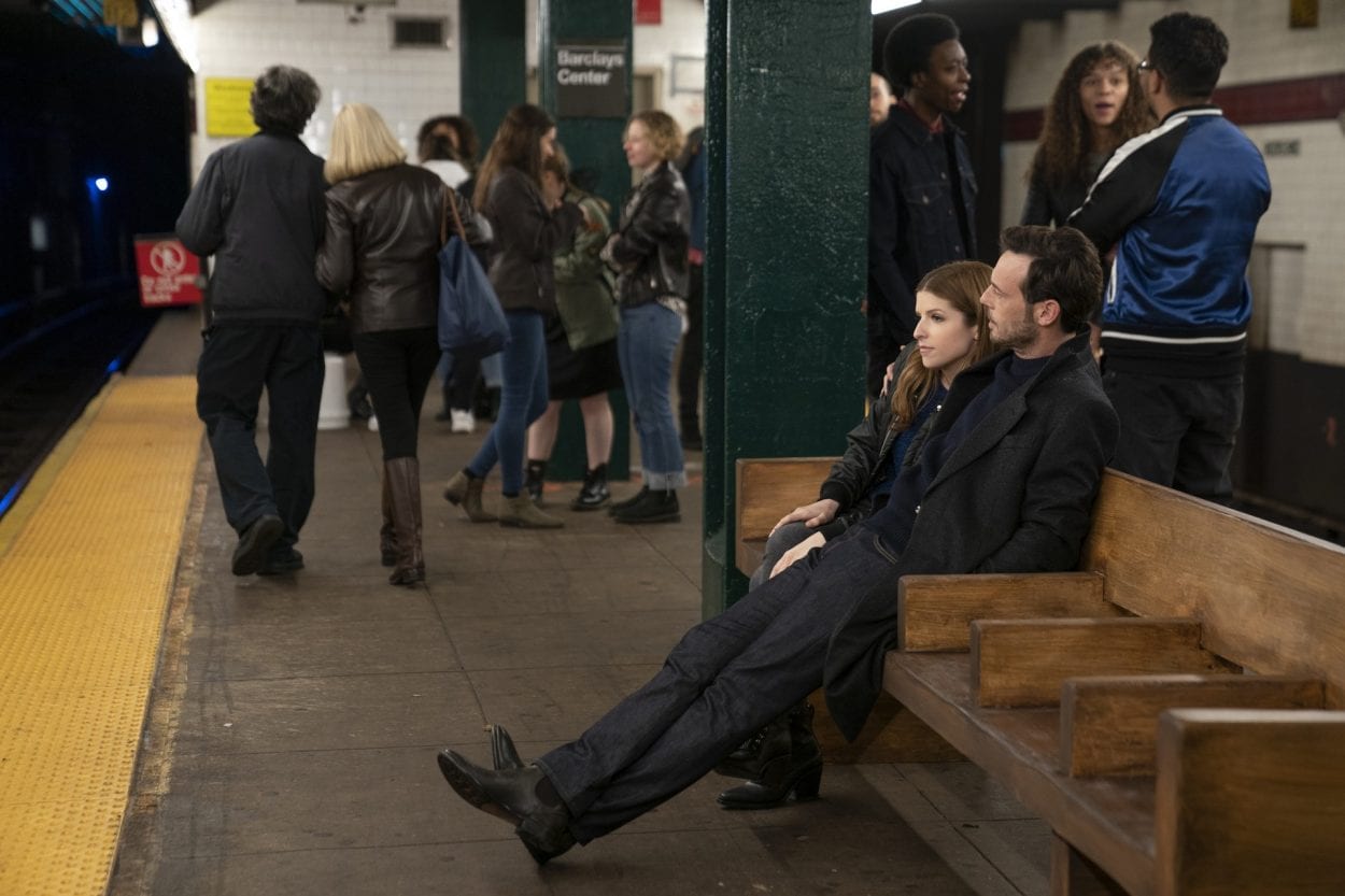 Darby and Bradley (Anna Kendrick and Scoot McNairy) sit on a subway station bench together.