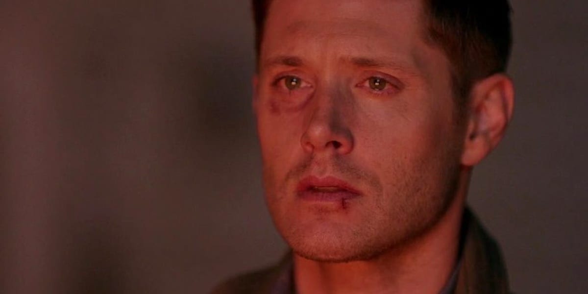 Dean looking heartbroken as Cas's body burns (off-camera) in the first episode of Season 13.