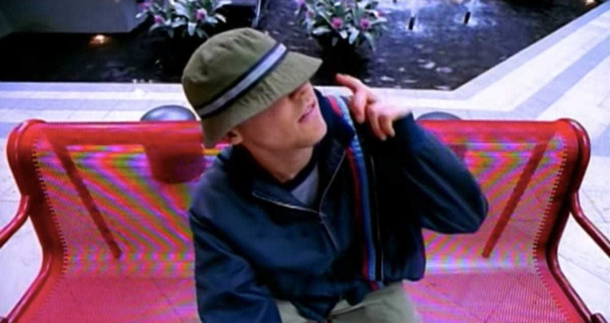 Gregg Alexander and hat disguise in the music video for New Radicals You Get What You Give