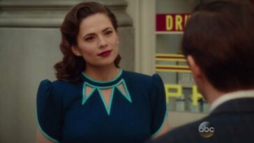 Peggy Carter (Hayley Atwell) looks on in Agent Carter.
