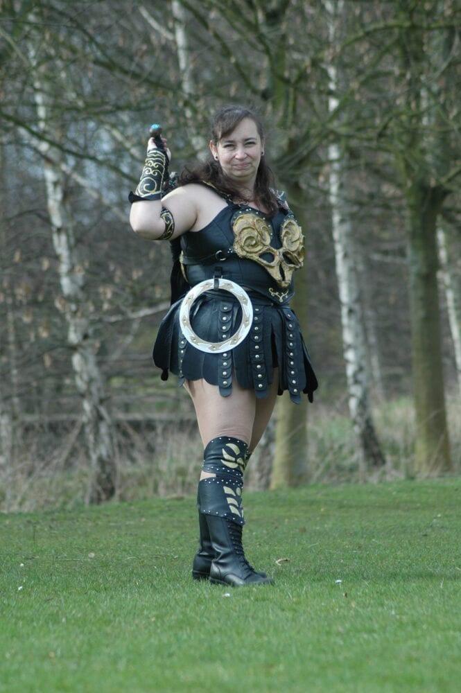 Xena cosplayer reaching for her sword