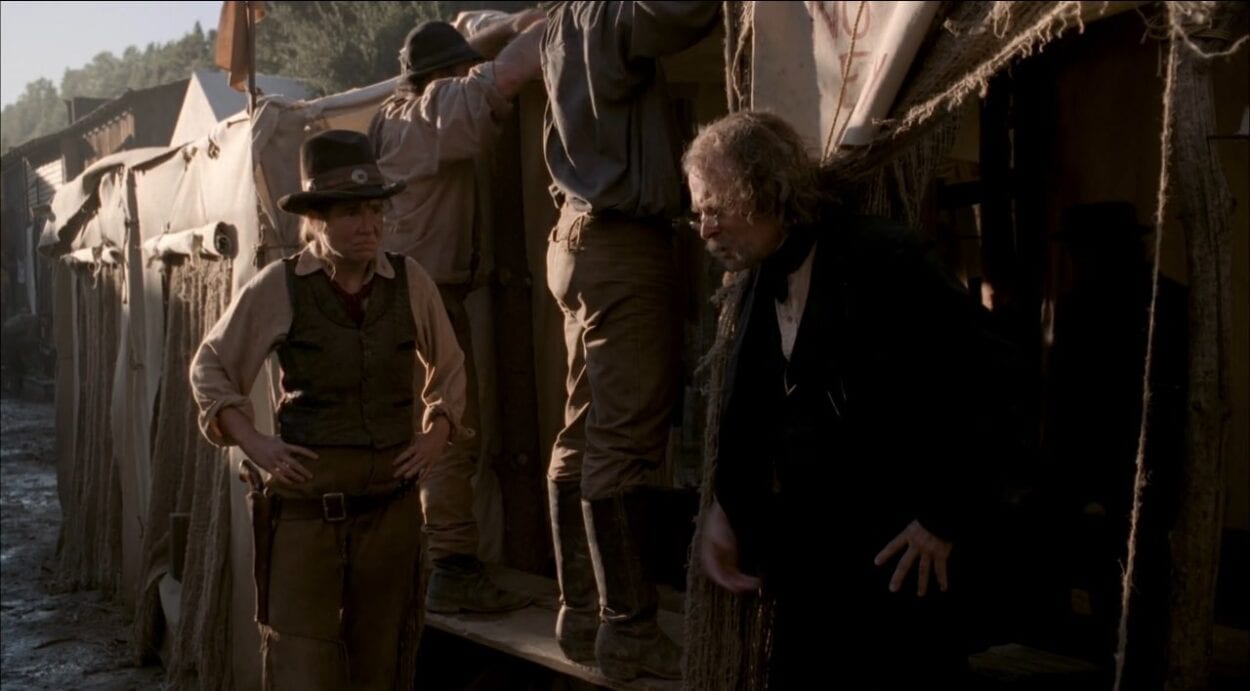 Doc Cochran (Brad Dourif) welcomes Calamity Jane (Robin Weigert) outside one of the "pest tents" in a scene from "Deadwood"