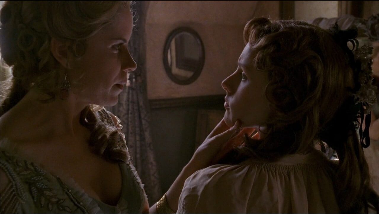 Joanie Stubbs (Kim Dickens) scolds Flora (Kristen Bell) in a scene from Deadwood.