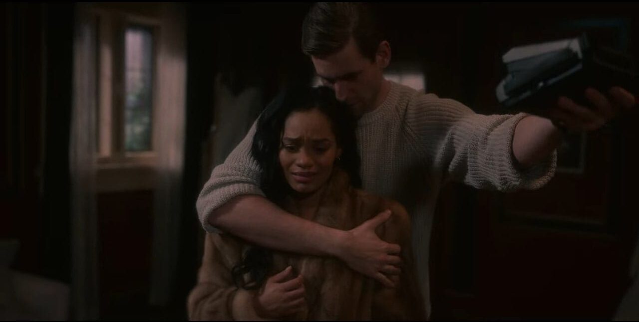 Rebecca and Peter embrace, but she is distraught in a scene from The Haunting Of Bly Manor