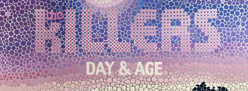 Day and Age album art, purple dots and styalised writing