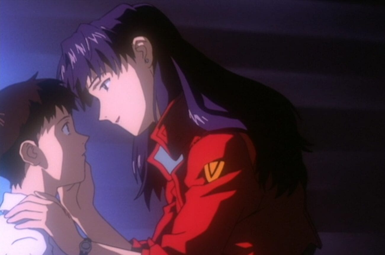 Misato looking into Shinji's eyes and caressing his cheek