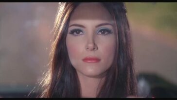 Samantha Robinson looks on in The Love Witch