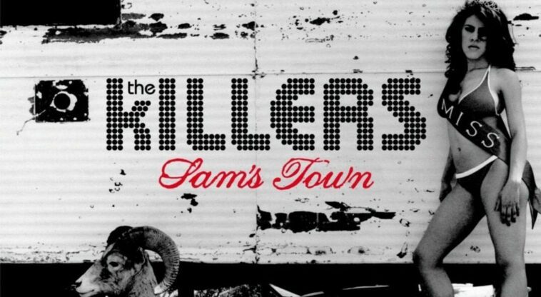 The Killers' Sam's Town album cover. A woman wearing a beauty contest sash stands against a caravan. There is a ram in the foreground