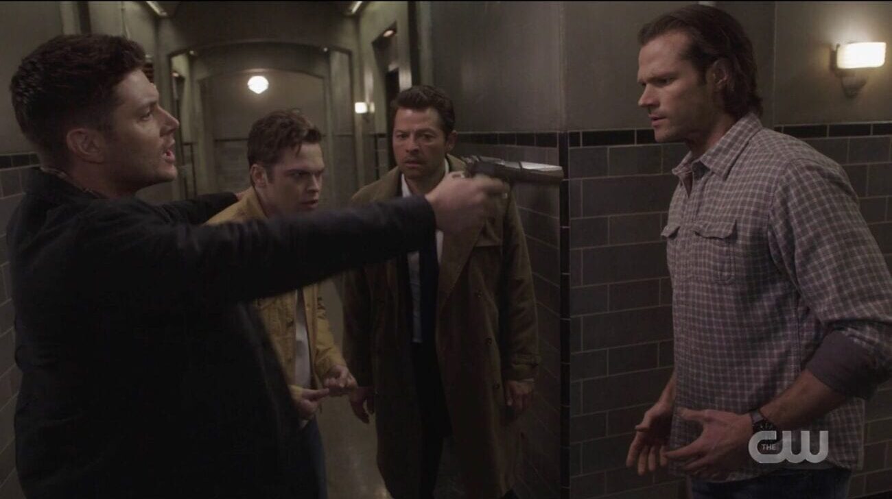 Dean pulls a gun on Sam.