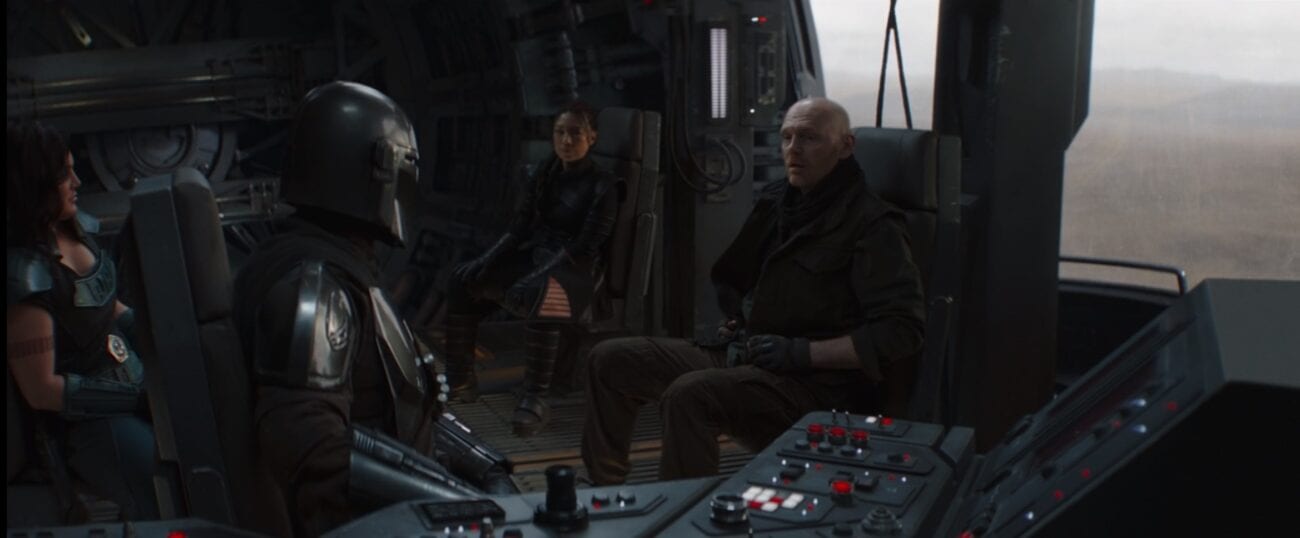Mando, Cara, Fennec and Mayfeld discuss a plan to get Moff Gideon's location