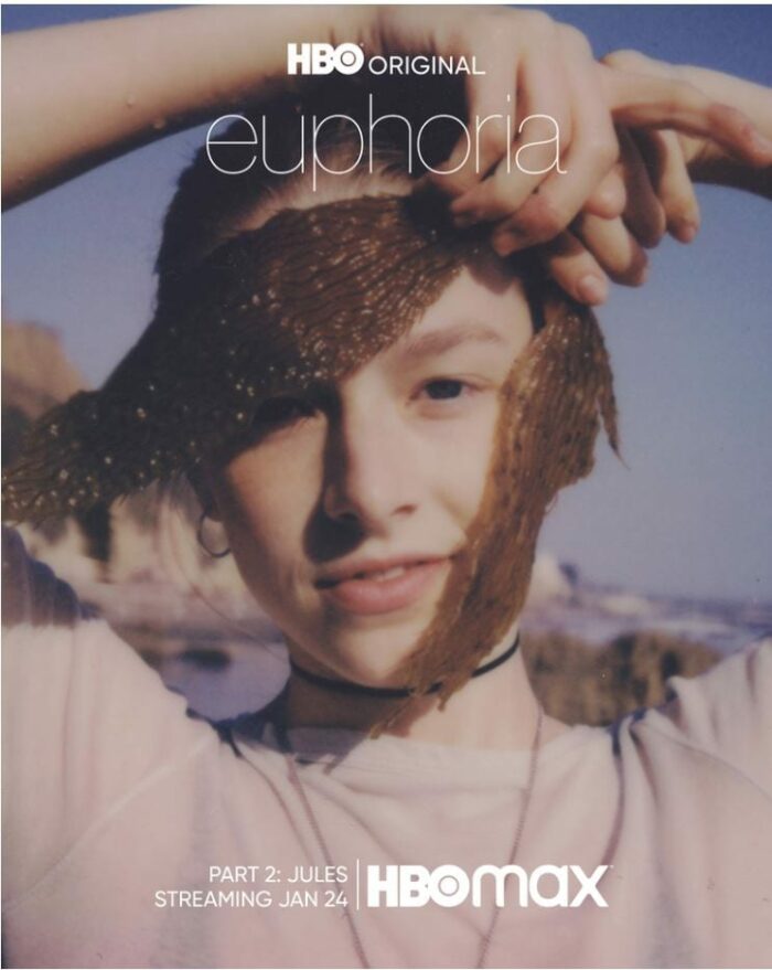 Jules drapes a piece of seaweed across her face at the beach on the Poster image for HBO's Euphoria